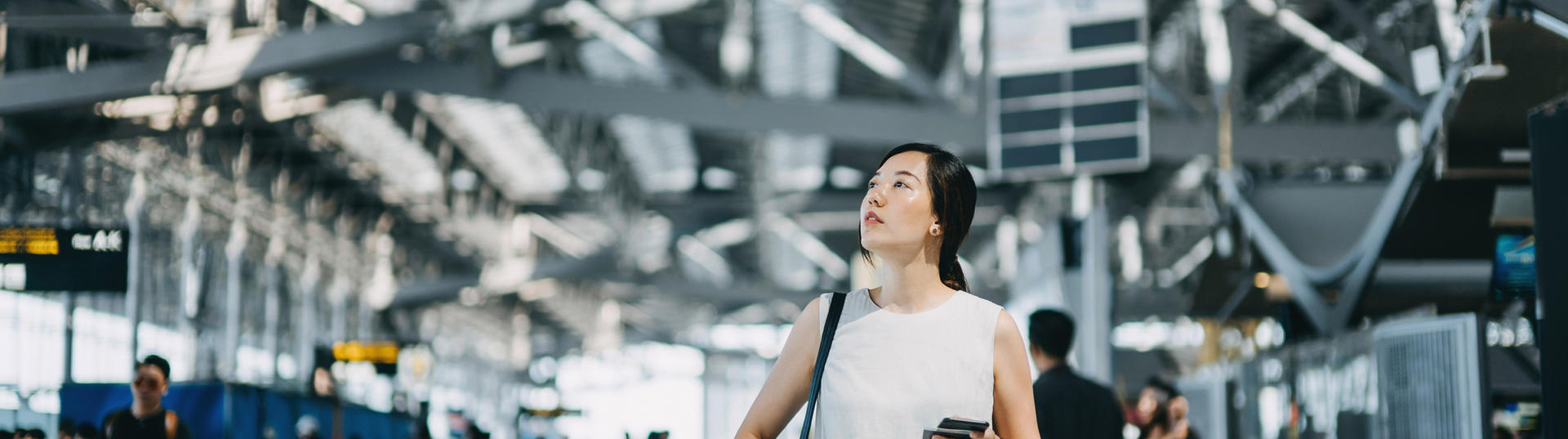 woman walking through airport