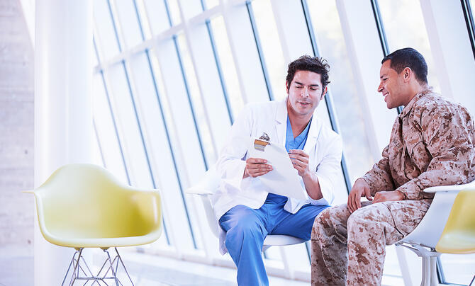 Military Health with doctor and solider discussing care