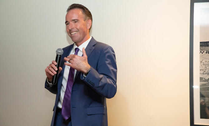 Kevin Kaiser holding microphone