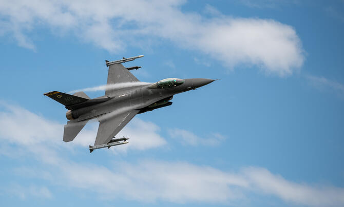 A U.S. Air Force F-16 Fighting Falcon aircraft performs a sortie