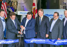 Dynetics leadership cutting a ribbon during ceremony