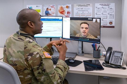 military doctor helping patient virtually