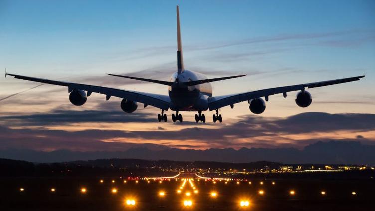 Airplane landing on runway