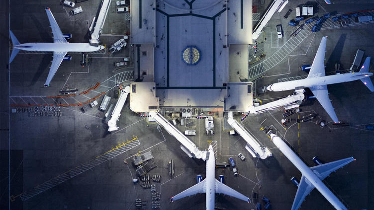 airport terminal gates with planes