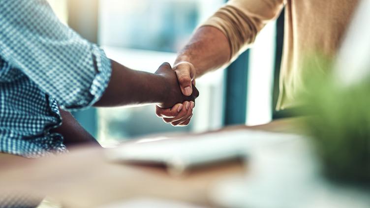 Two people shaking hands