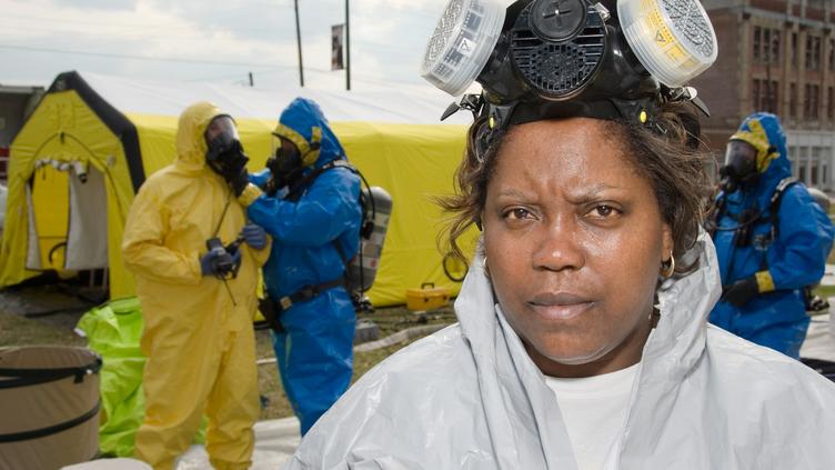 A woman wearing a gas mask